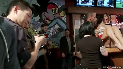 Public gang-bang of hot brunette slut