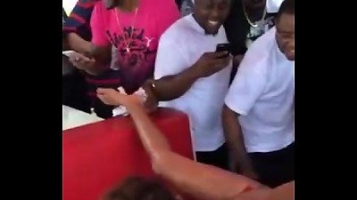 wild dark-hued dame drizzling in Public