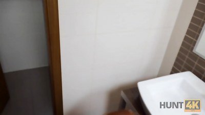 HUNT4K. Hunter plumbs cool redhead in the public toilet