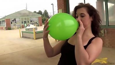 Fifi Foxx Blows and spunks Balloons Outdoors