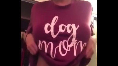 nubile in red shirt demonstrate knockers