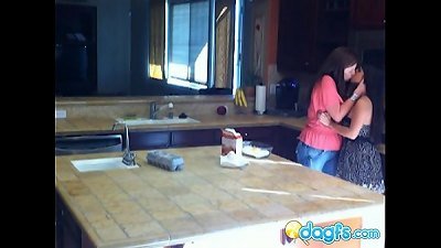 horny milf gobbles teenager twat in the kitchen