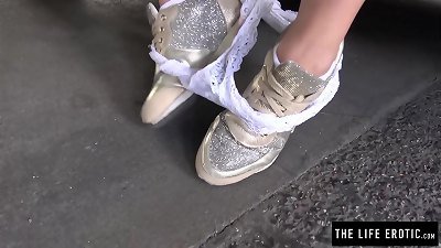 uber-cute lady jerks publicly in a parking garage